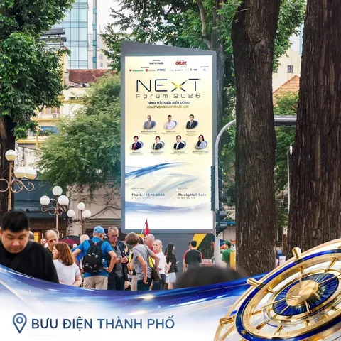 NExT Forum 2026 on an LED screen at Bưu điện Thành phố